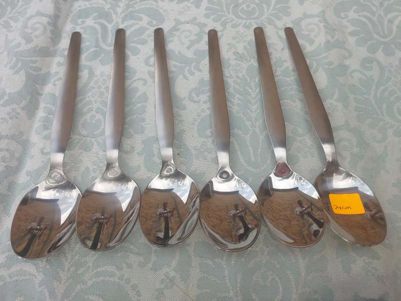 A SET OF 6 S/S TEASPOONS SOLD AS IS