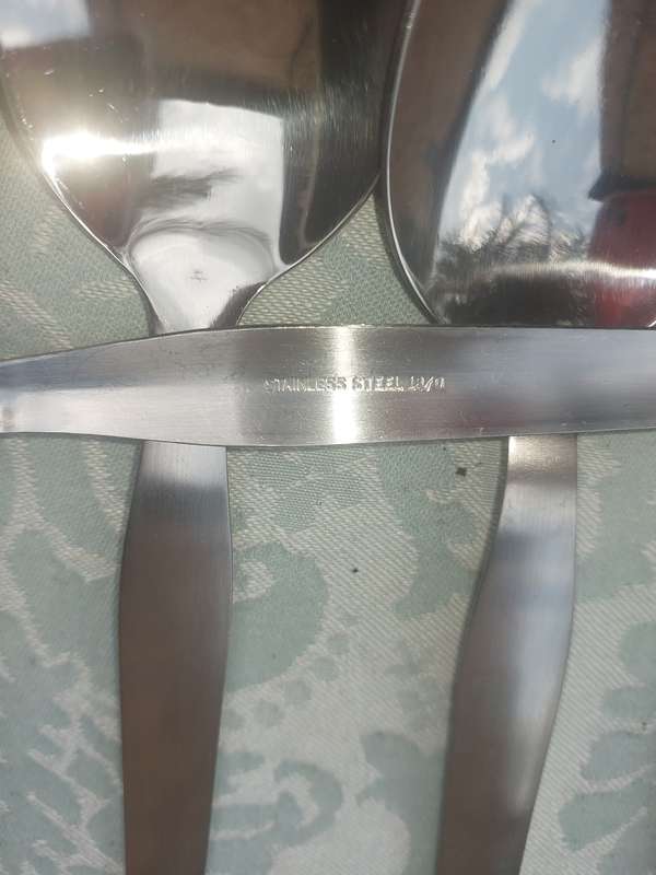 A SET OF 6 S/S TEASPOONS SOLD AS IS