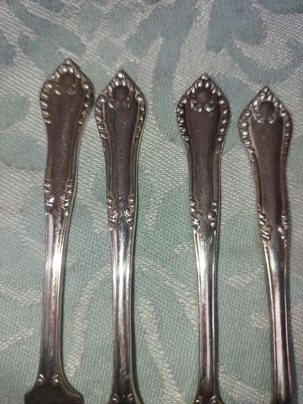 A VINTAGE SET OF 12 EMESS EPNS PLATE DESERT FORKS SOLD AS IS