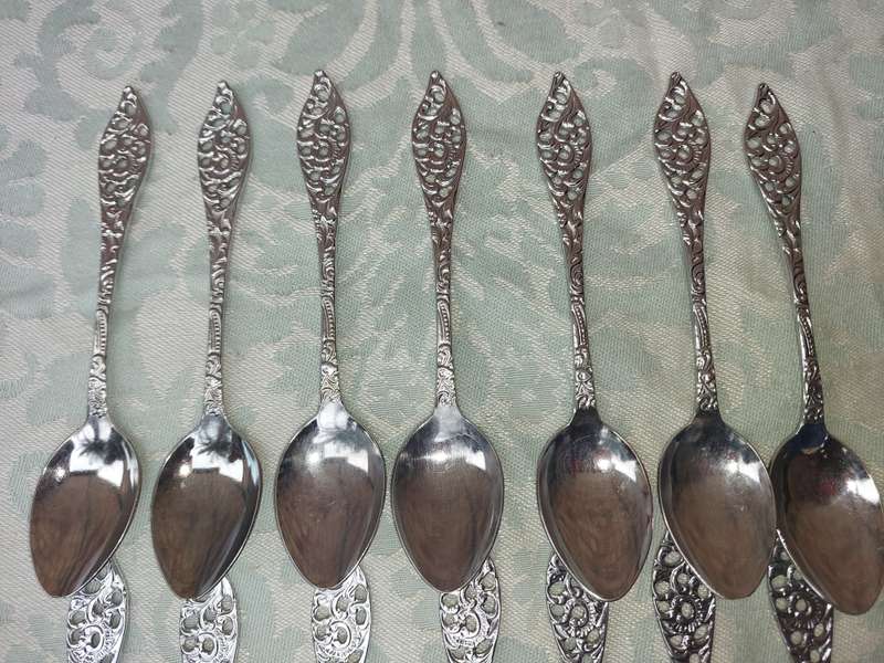 A SET OF 14 CAKE CUTLERY CHROME PLATE IN MINT CONDITION SOLD AS IS
