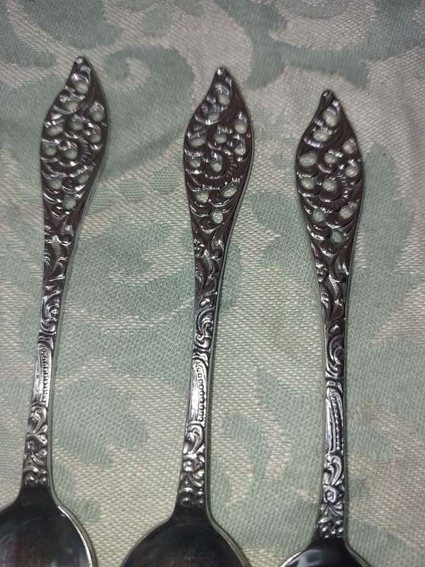 A SET OF 14 CAKE CUTLERY CHROME PLATE IN MINT CONDITION SOLD AS IS