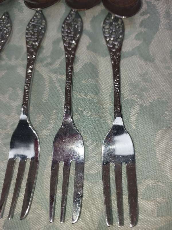 A SET OF 14 CAKE CUTLERY CHROME PLATE IN MINT CONDITION SOLD AS IS