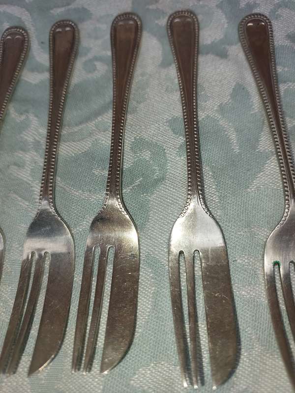 A SET OF 9 EPNS A1 COCKTAIL CUTLERY SET SOLD AS IS