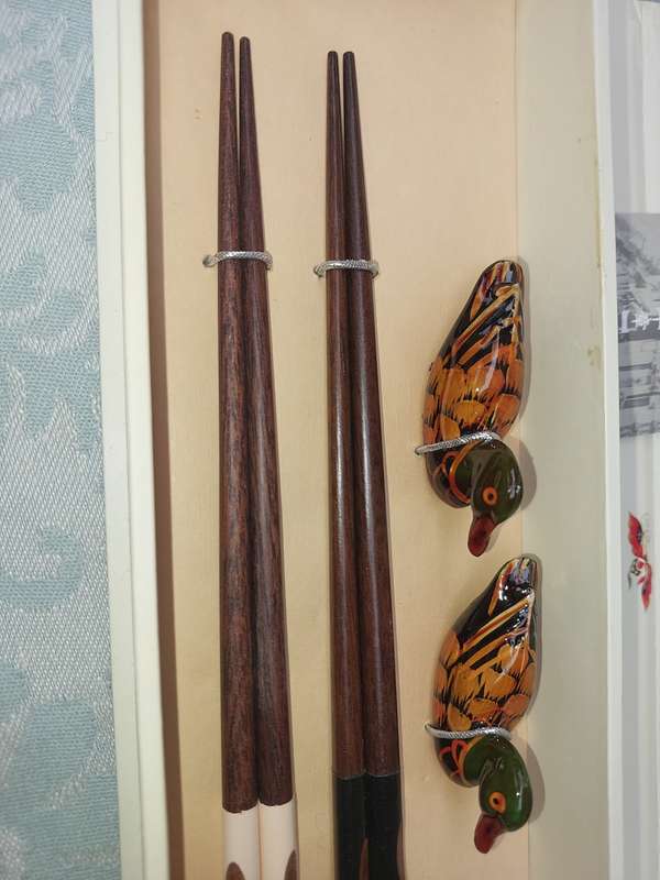 A VINTAGE CHOPSTICK SET DUCK SOLD AS IS