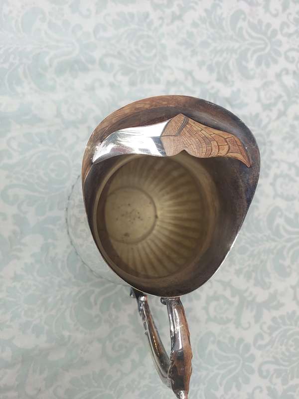 A VINTAGE EMESS SP ON B WATER JUG SOLD AS IS