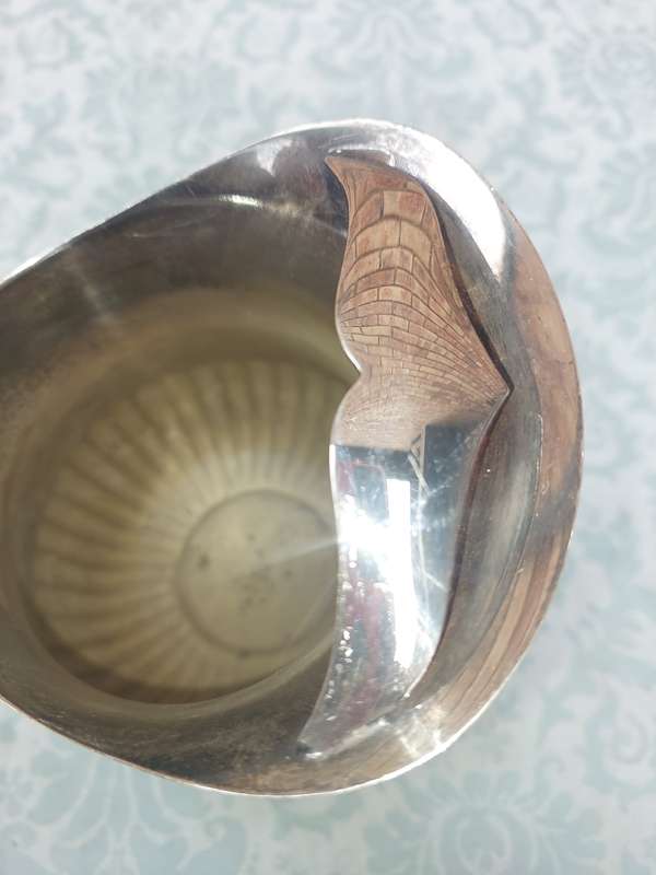 A VINTAGE EMESS SP ON B WATER JUG SOLD AS IS