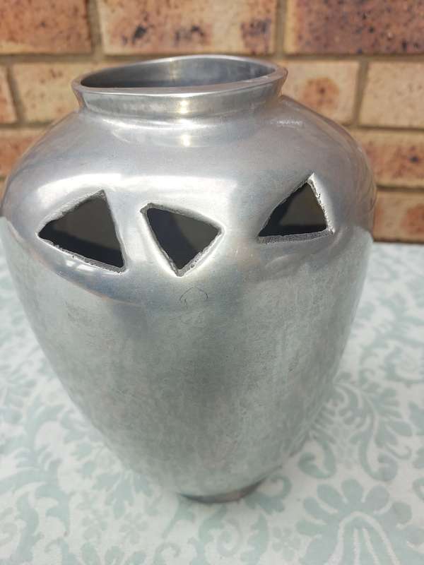 AN ART DECOR ALLOY PEWTHAL VASE SOLD AS IS