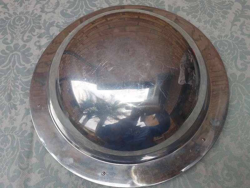 AN ART DECOR ALLOY ROUND SERVING PLATTER SOLD AS IS