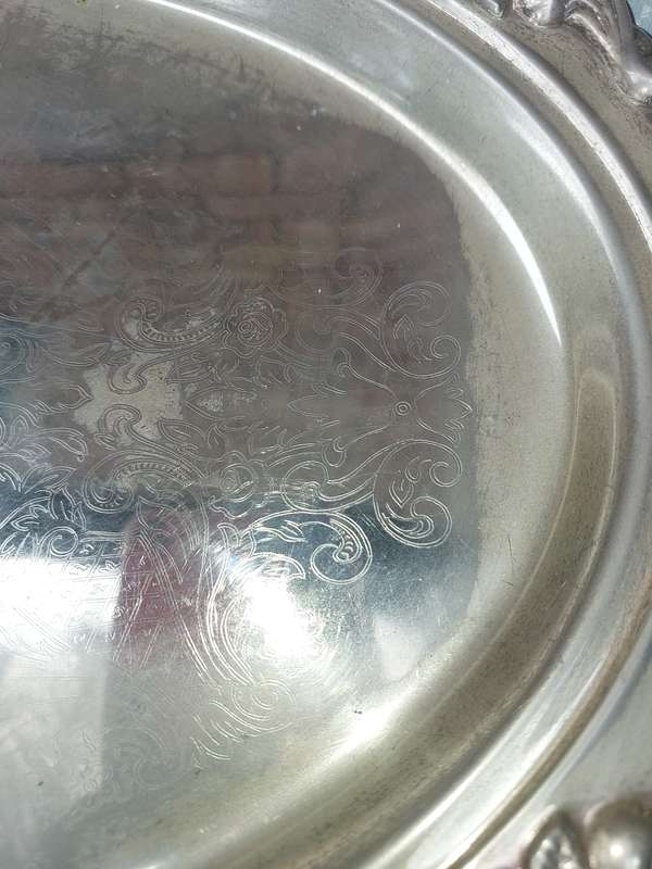 A VICTORIAN STYLE VINTAGE SILVER PLATED PLATTER SOLD AS IS