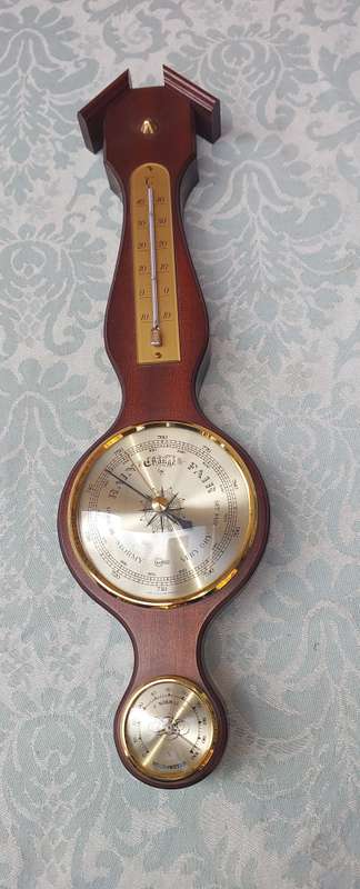 A WEATHER STATION , TEMPERATURE , HUMIDITY BAROMETER SOLD AS IS