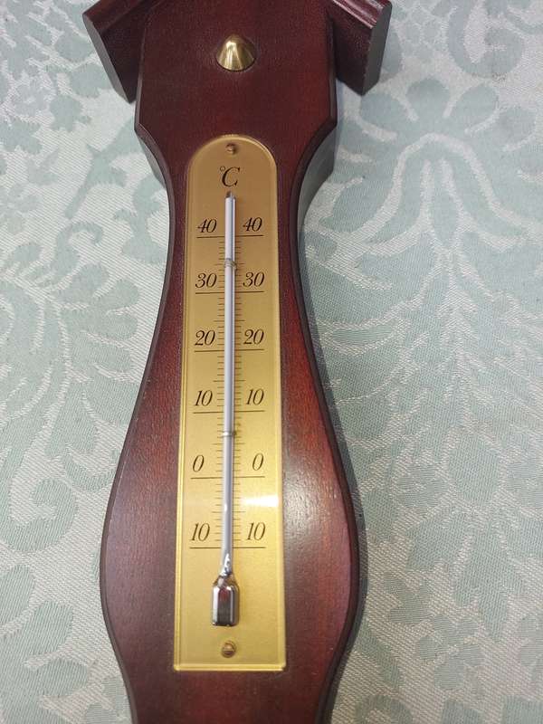 A WEATHER STATION , TEMPERATURE , HUMIDITY BAROMETER SOLD AS IS