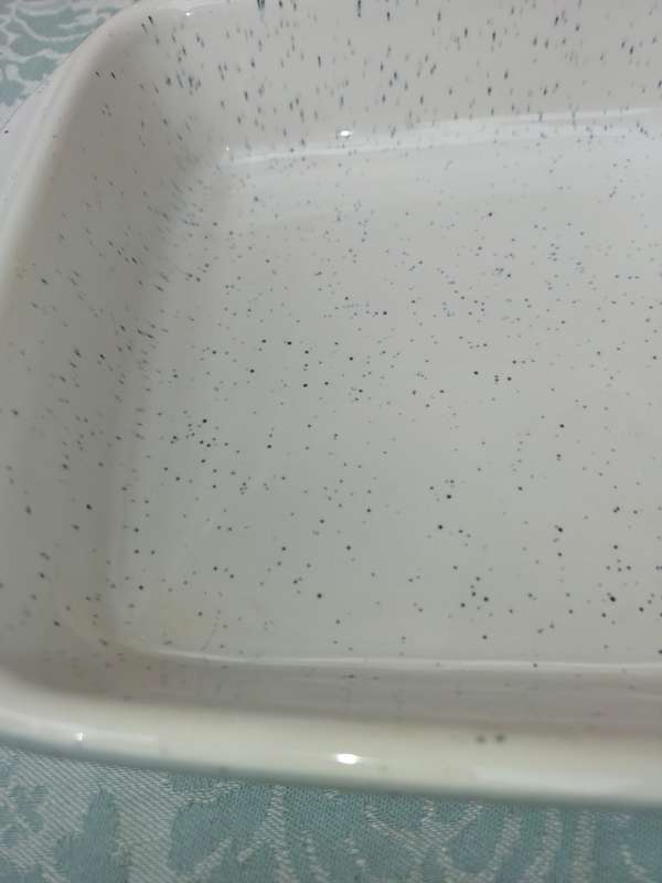 A RECTANGULAR STONE WARE CASSEROLE BY CONTINENTAL SOLD AS IS
