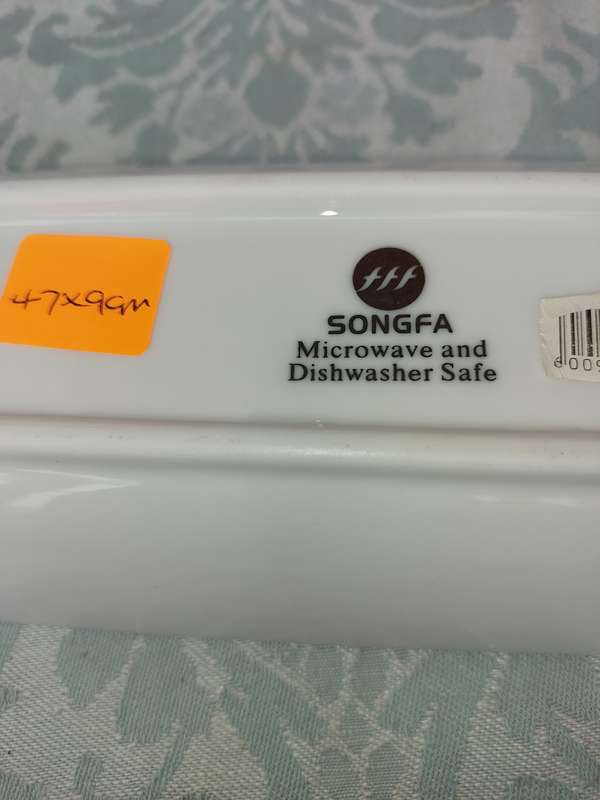 A 47 CENTIMETER SONGWA WHITE PORCELAIN PLATTER SOLD AS IS