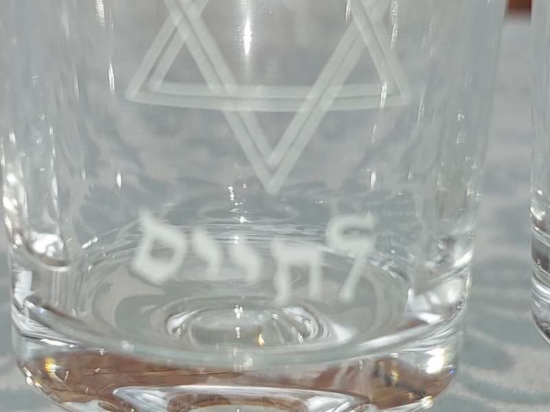 A SET OF 4 KIDDUSH GLASSES SOLD AS IS