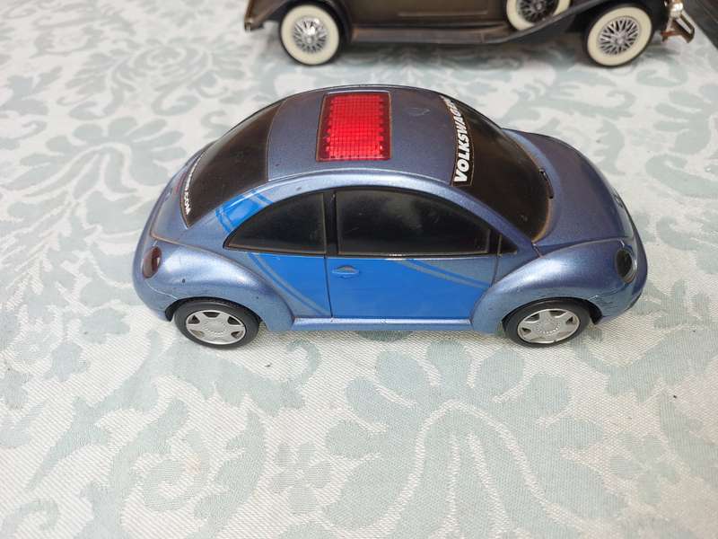 A VINTAGE COLLECTION MODEL CARS SOLD AS IS