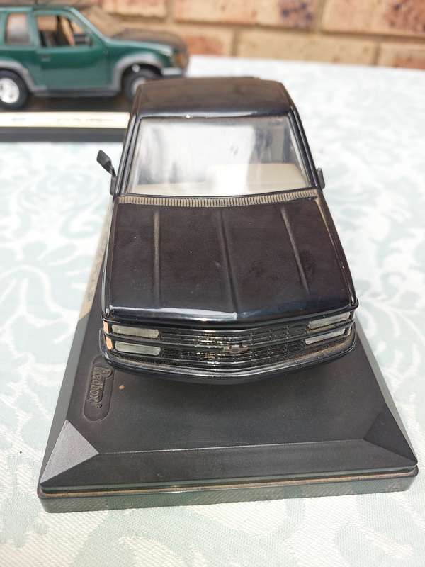 A VINTAGE COLLECTION MODEL CARS SOLD AS IS