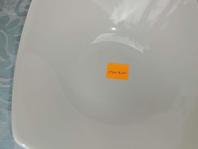 A COLLECTION OF 7 WHITE PORCELAIN SERVING PLATTERS SOLD AS IS