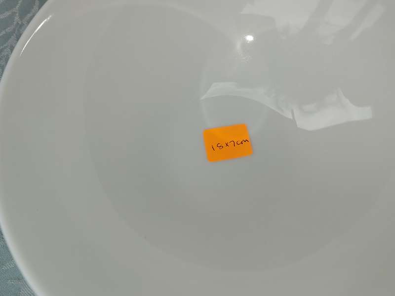 A COLLECTION OF 7 WHITE PORCELAIN SERVING PLATTERS SOLD AS IS