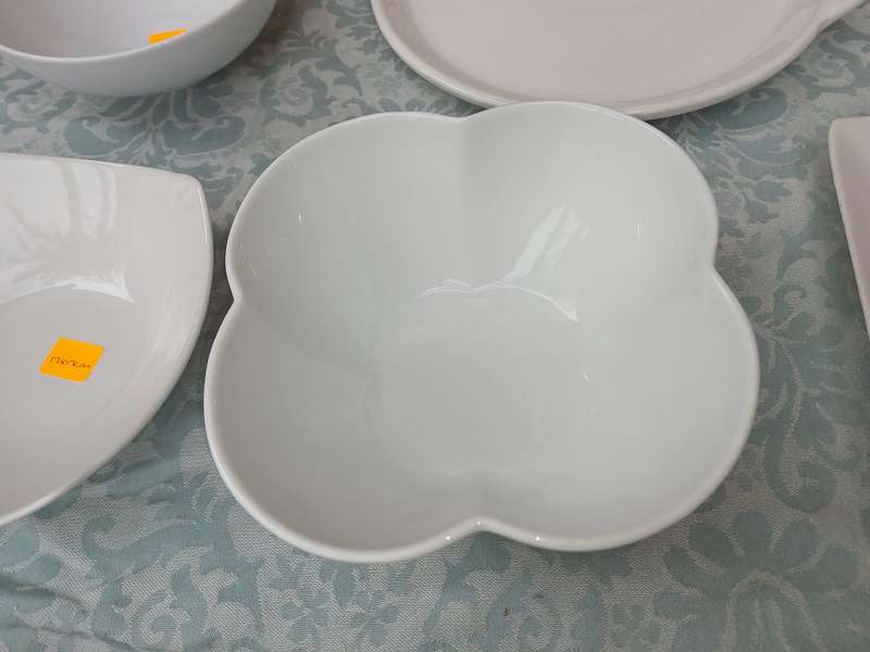 A COLLECTION OF 7 WHITE PORCELAIN SERVING PLATTERS SOLD AS IS