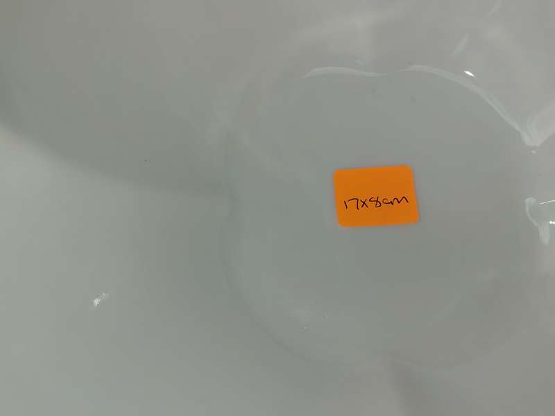 A COLLECTION OF 7 WHITE PORCELAIN SERVING PLATTERS SOLD AS IS