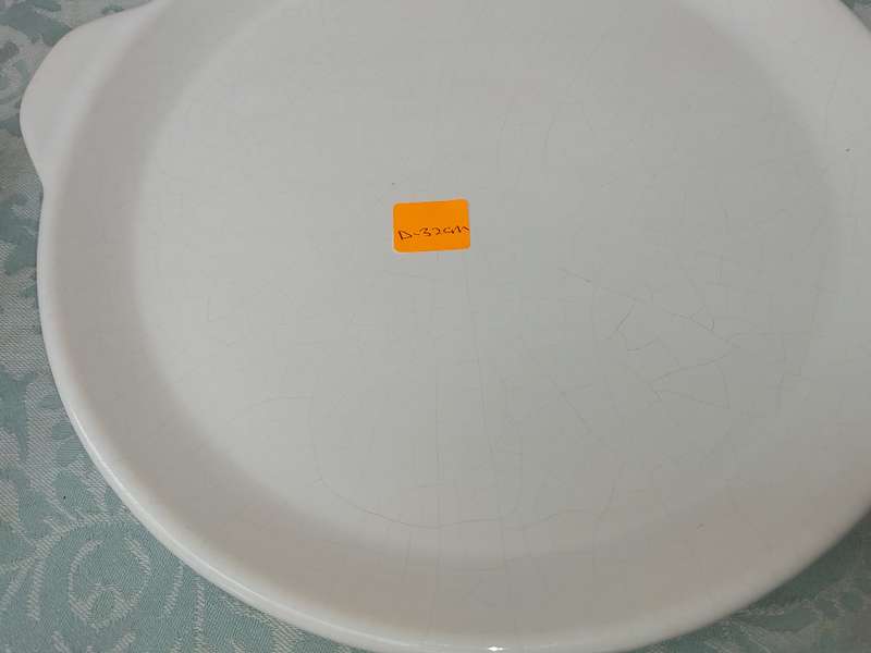 A COLLECTION OF 7 WHITE PORCELAIN SERVING PLATTERS SOLD AS IS