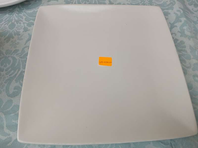 A COLLECTION OF 7 WHITE PORCELAIN SERVING PLATTERS SOLD AS IS