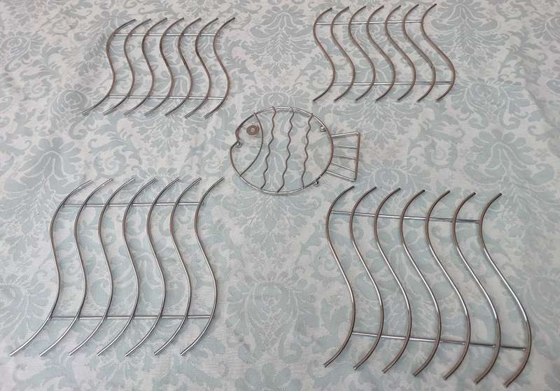 A COLLECTION OF HOT POT TABLE GRIDS STAINLESS STEEL SOLD AS IS