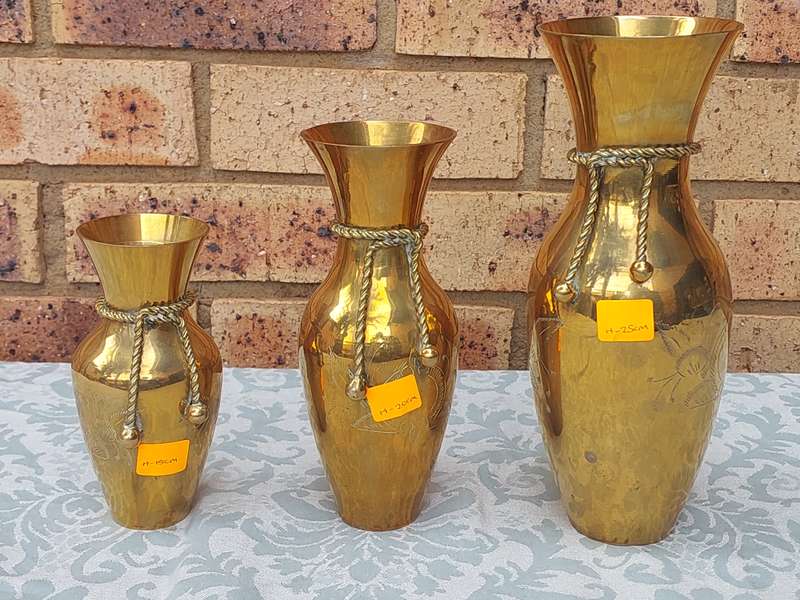 A SET OF 3 ART DECOR BRASS VASES SOLD AS IS