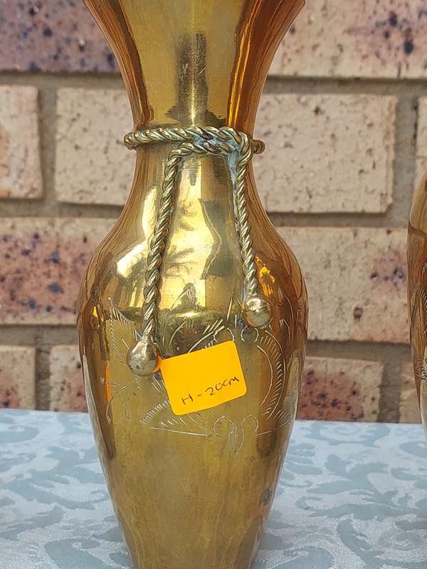 A SET OF 3 ART DECOR BRASS VASES SOLD AS IS