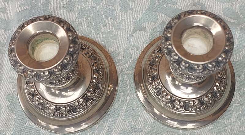 A SET OF TWO SHORT TABLE TOP CANDLES HOLDERS SOLD AS IS