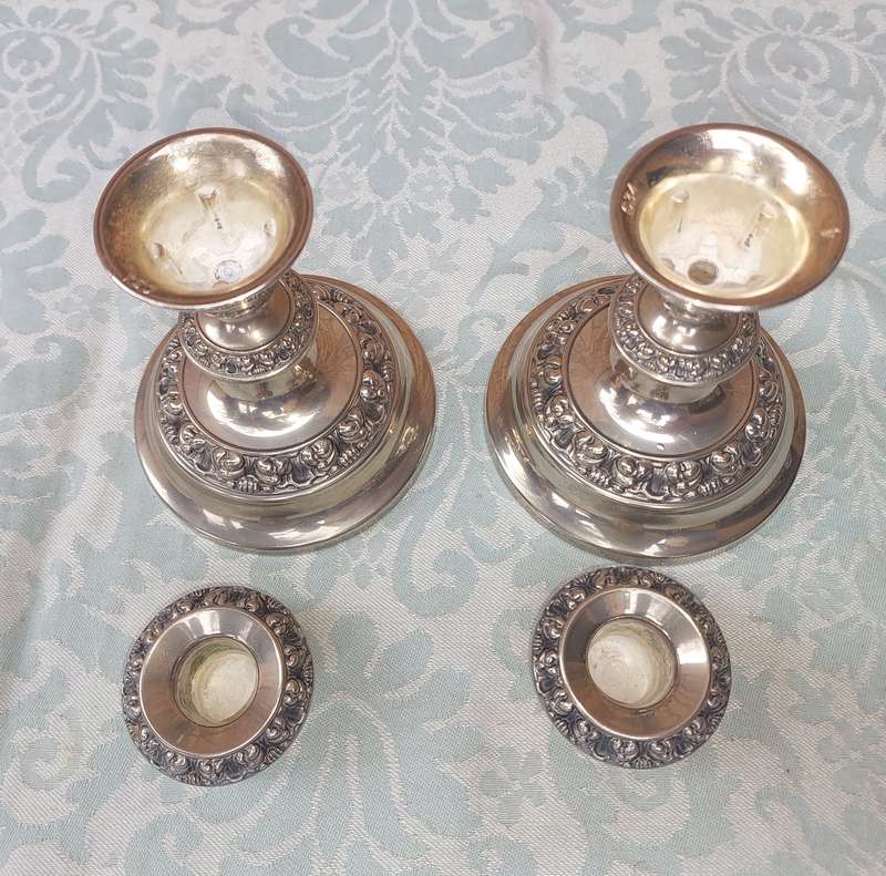 A SET OF TWO SHORT TABLE TOP CANDLES HOLDERS SOLD AS IS