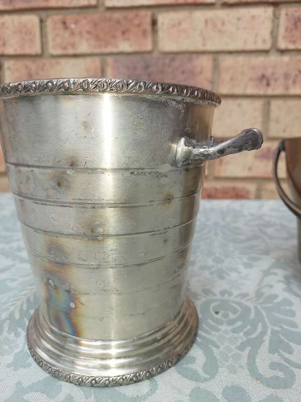 TWO VINTAGE ICE BUCKETS SOLD AS IS