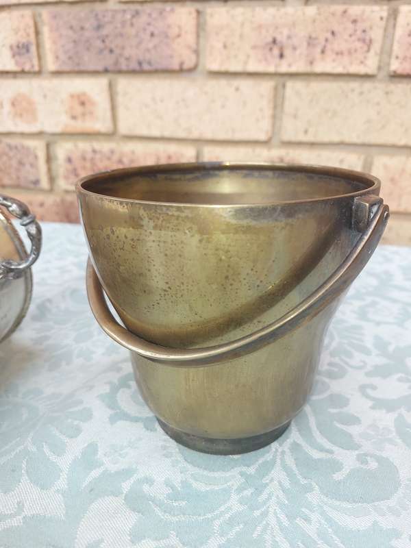 TWO VINTAGE ICE BUCKETS SOLD AS IS