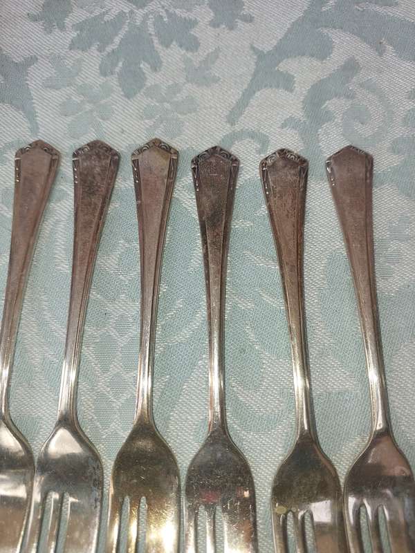 A VINTAGE SET OF DESERT FORKS EPNS SOLD AS IS