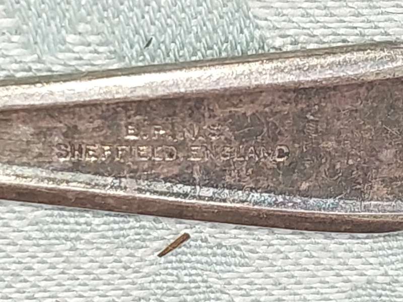 A SET OF 9 SHEFFIELD EPNS DESERT FORKS  SOLD AS IS