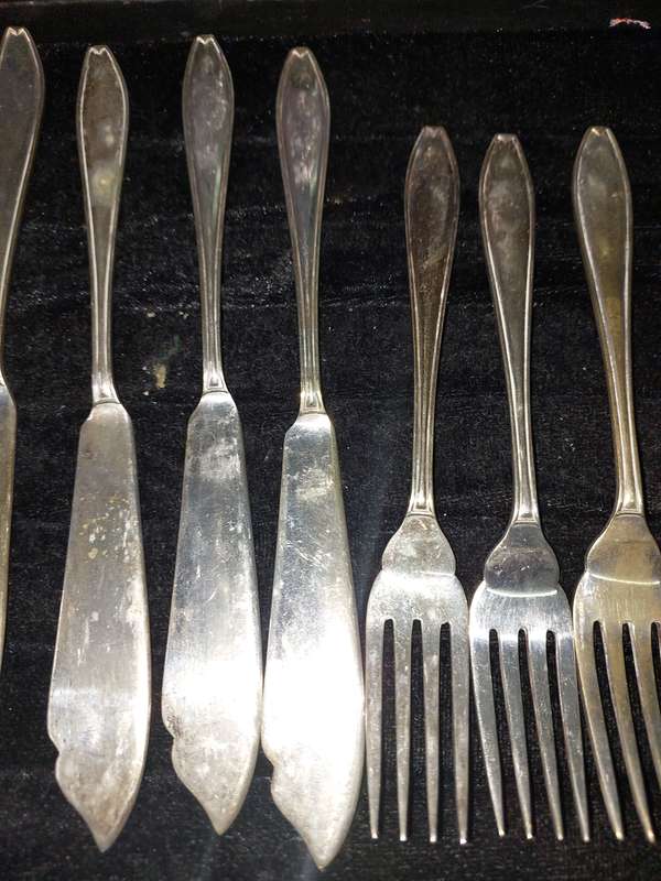A SET OF 12 EPNS FISH KNIFE AND FORK SET SOLD AS IS