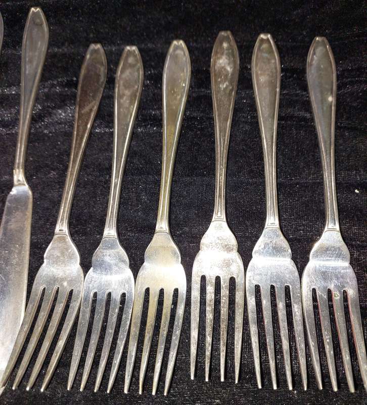 A SET OF 12 EPNS FISH KNIFE AND FORK SET SOLD AS IS