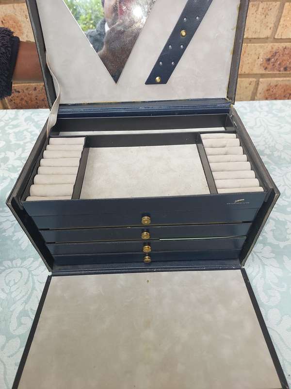 TWO LEATHER FAUX JEWELRY BOXES NEEDS TO BE CLEANED IN RELATIVE GOOD CONDITION SOLD AS IS
