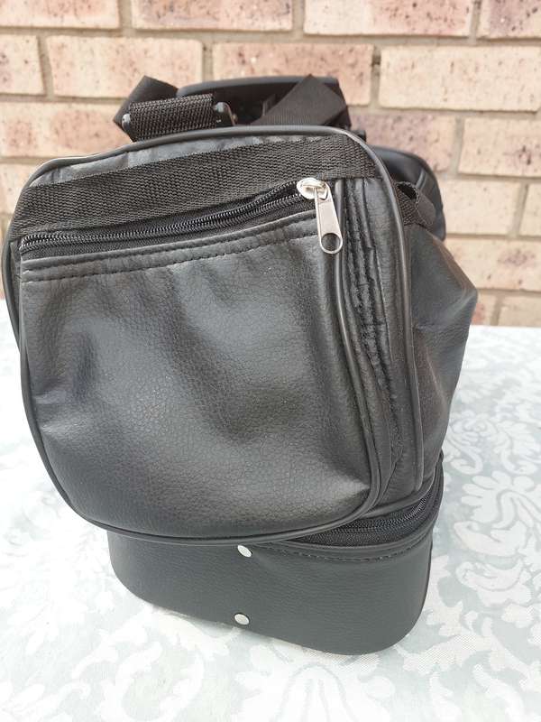 A BLACK FAUX LEATHER BAG FOR THE LADIES SOLD AS IS