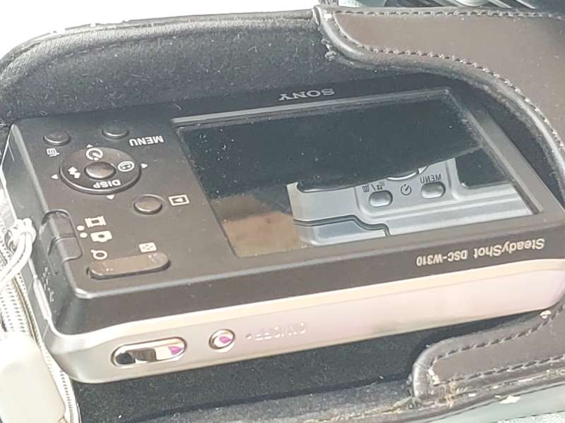 A JOBLOT POCKET CAMERAS AND A NINTENDO GAME WITH ALL THE GAMES SOLD AS IS NOT TESTED