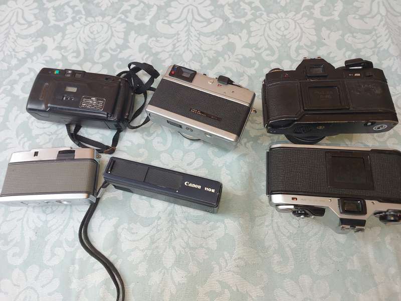 A VINTAGE JOBLOT CAMERAS SOLD AS IS NOT TESTED