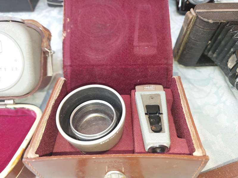 AN ANTIQUE COLLECTION CAMERAS SOLD AS IS NOT TESTED