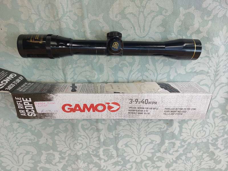 A USED GAMMO 3-9X40 W1PM AIR RIFLE SCOPE WITH OUT THE BRACKET FOR MOUNTING SOLD AS IS