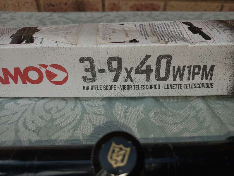 A USED GAMMO 3-9X40 W1PM AIR RIFLE SCOPE WITH OUT THE BRACKET FOR MOUNTING SOLD AS IS