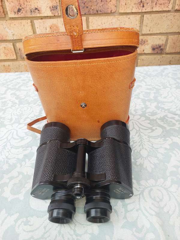 A VINTAGE ROS TRIPLE COATED TESTED OIOTIC 10X 50 BINOCULARS SOLD AS IS
