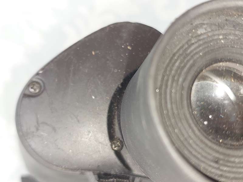 A USED 60X60 BINOCULARS SOLD AS IS