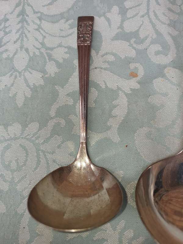 TWO SOUP LADELS SOLD AS IS