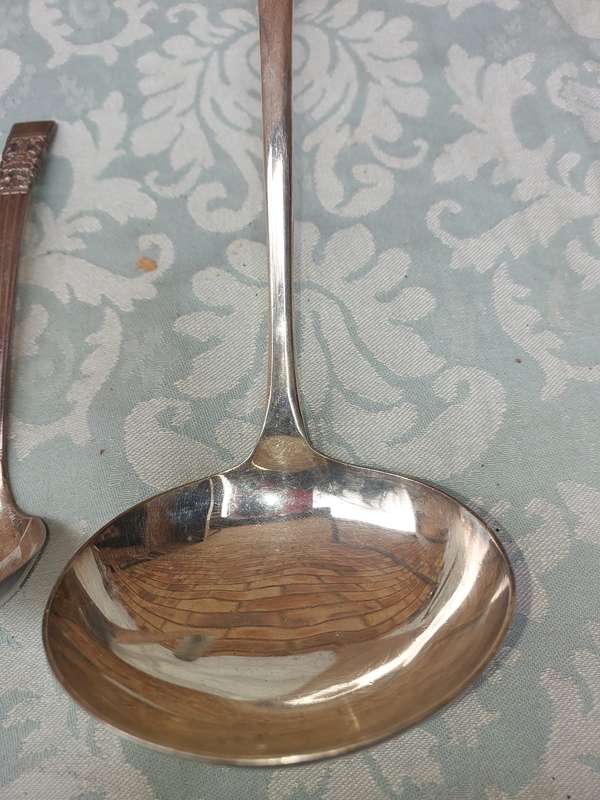 TWO SOUP LADELS SOLD AS IS