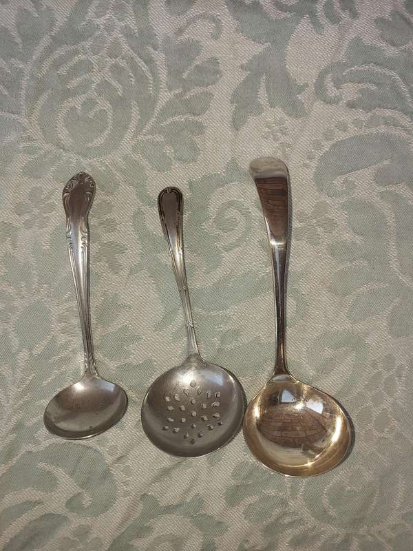 A COLLECTION OF 3 SUGAR OR SAUCE LADLES SOLD AS IS