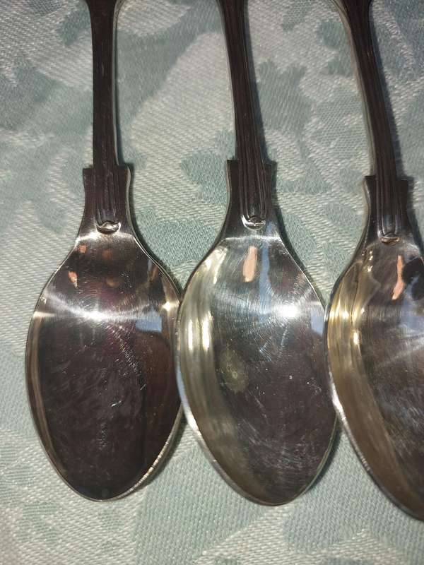 A VINTAGE SET OF 7 DEMITASSE EPNS A1 SHEFFIELED ENGLAND SPOONS SOLD AS IS